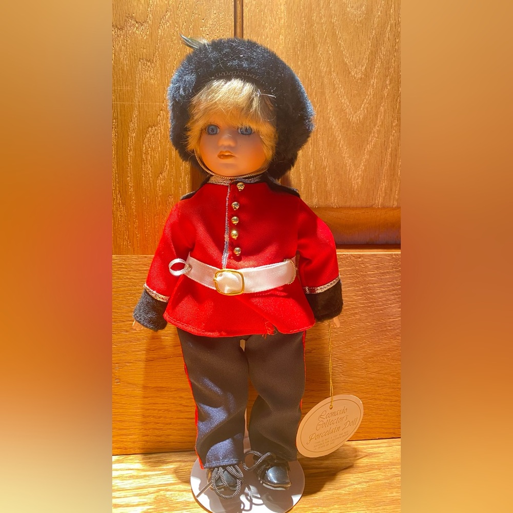Elegant Red Guard Doll with Black Accents
